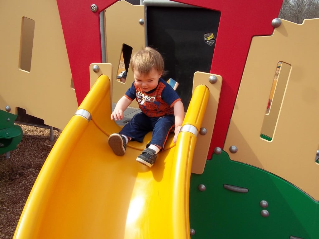 Thor on slide Elm Creek Park Reserve in Maple Grove, Minnesota