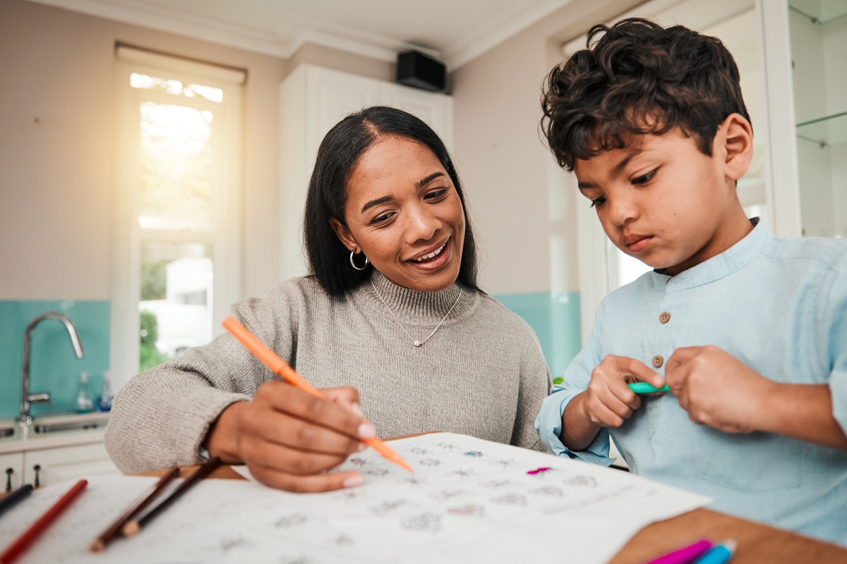 Mom helping child with homework